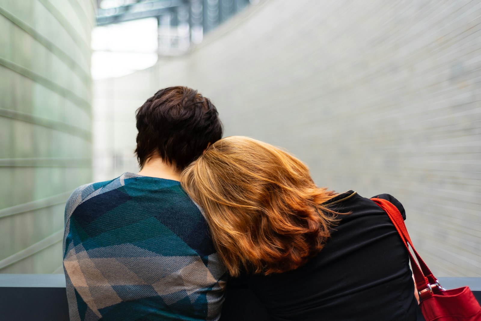 Spouse carrying the emotional weight of a partner, illustrating enabling and codependency