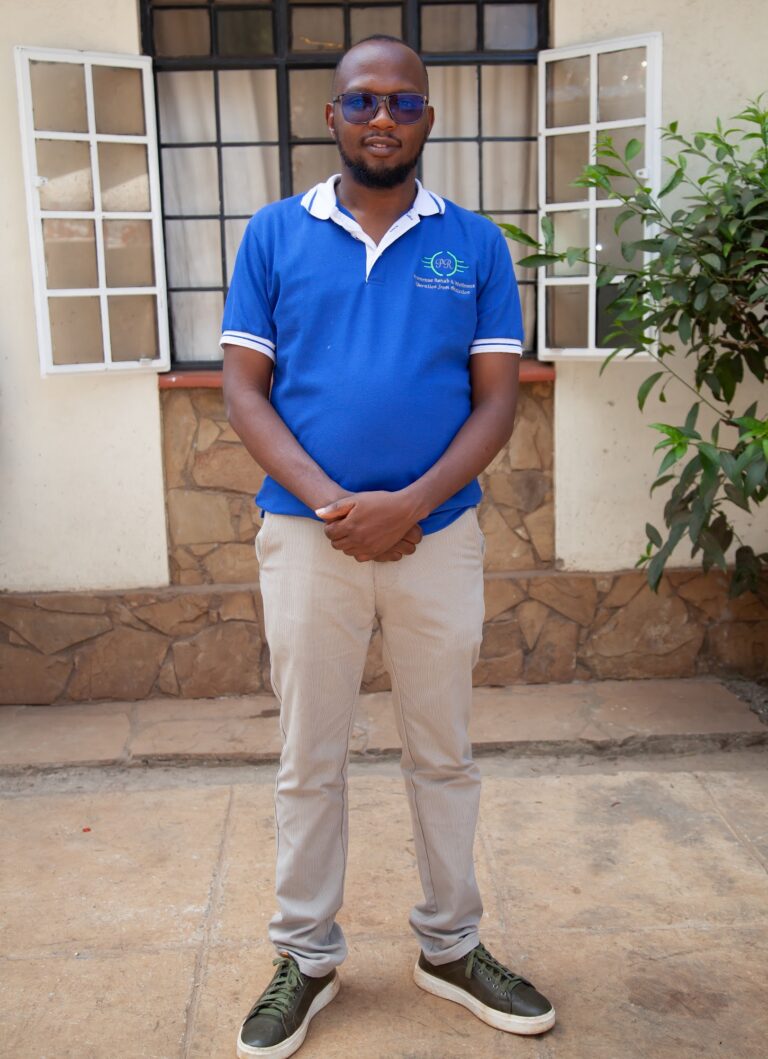 Primrose Rehab and Wellness staff member in uniform in the grounds of the Thindigua centre