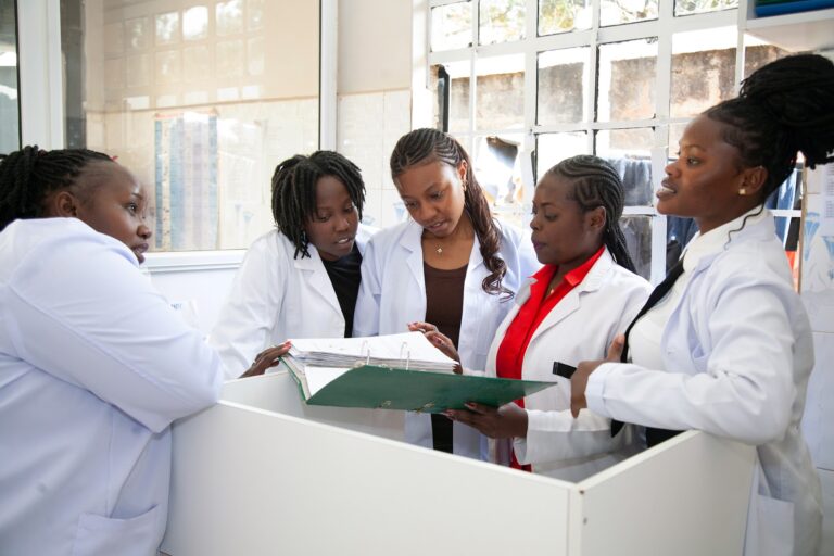 Primrose Rehab and Wellness clinical team reviewing client records during a case review meeting