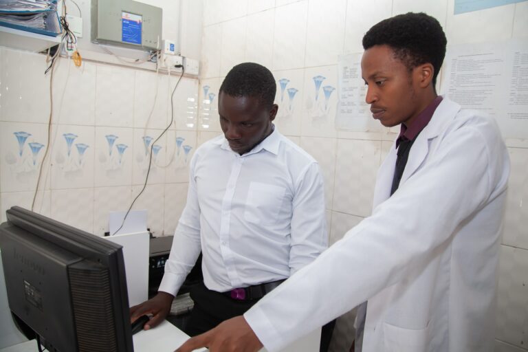 Primrose Rehab and Wellness staff reviewing records at the centre's clinical workstation