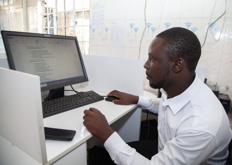 Primrose Rehab and Wellness clinician updating clinical records at the Thindigua centre